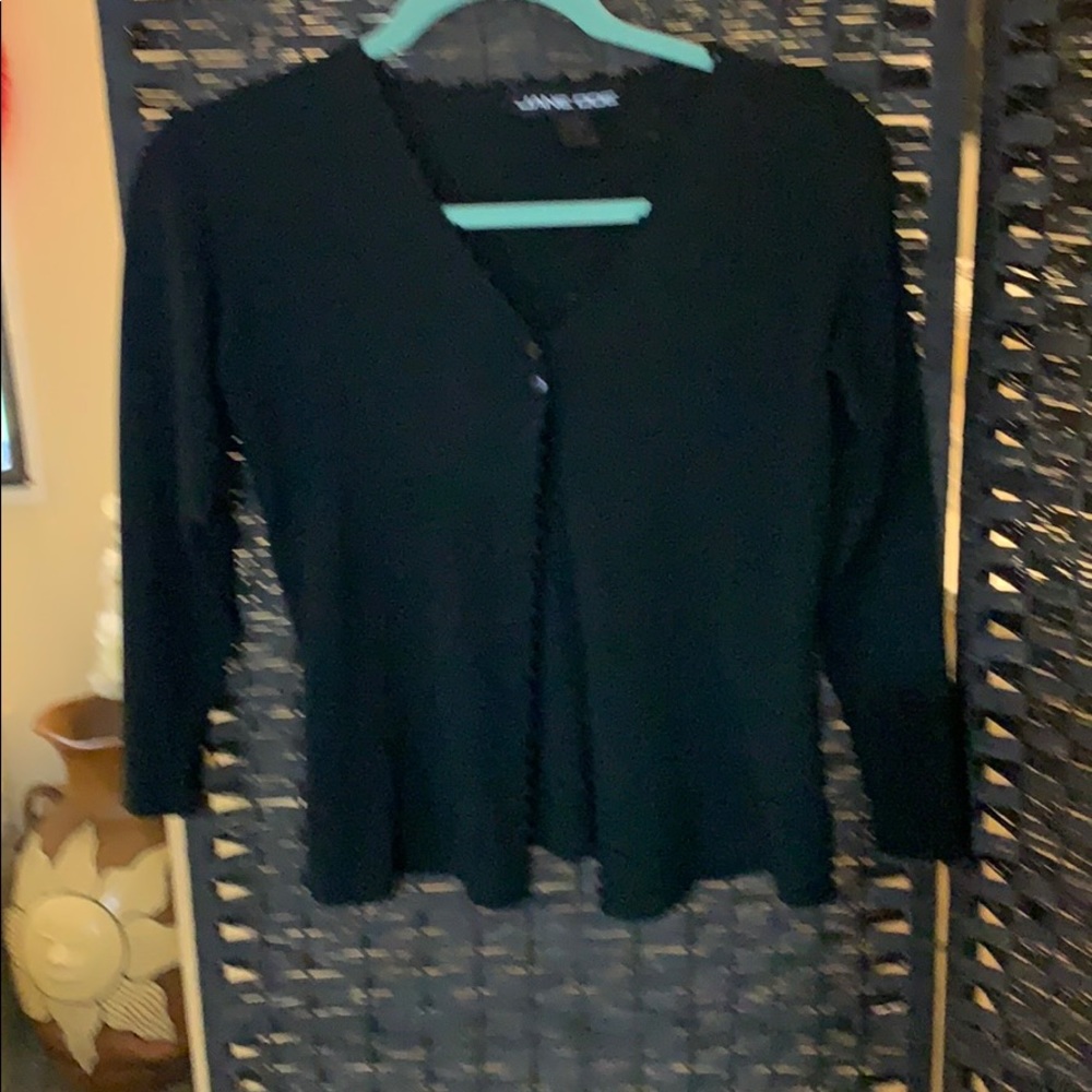 Beautifully made 3/4 sleeve waist high cardigan.